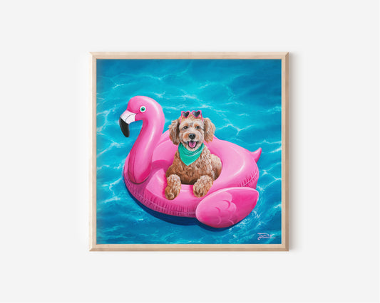 Fine Art Print by Australian Artist Jessica Alpert of a golden, curly haired Cavoodle dog, wearing vibrant pink sunglasses on it's head and a mint green bandana around it's neck, sitting and smiling comfortably in an inflatable hot pink flamingo pool floaty, floating on vibrant, sparkly blue water.