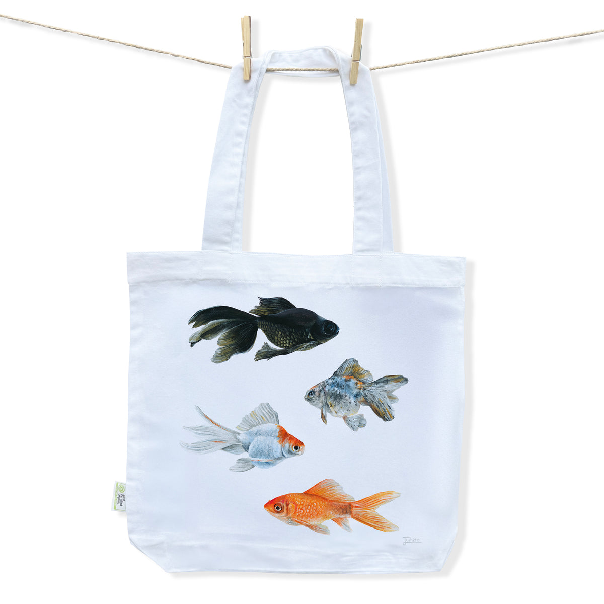 White tote bag with a detailed and colourful goldfish design hand painted by Australian Artist Jessica Alpert.